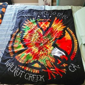 The story so far flag tapestry